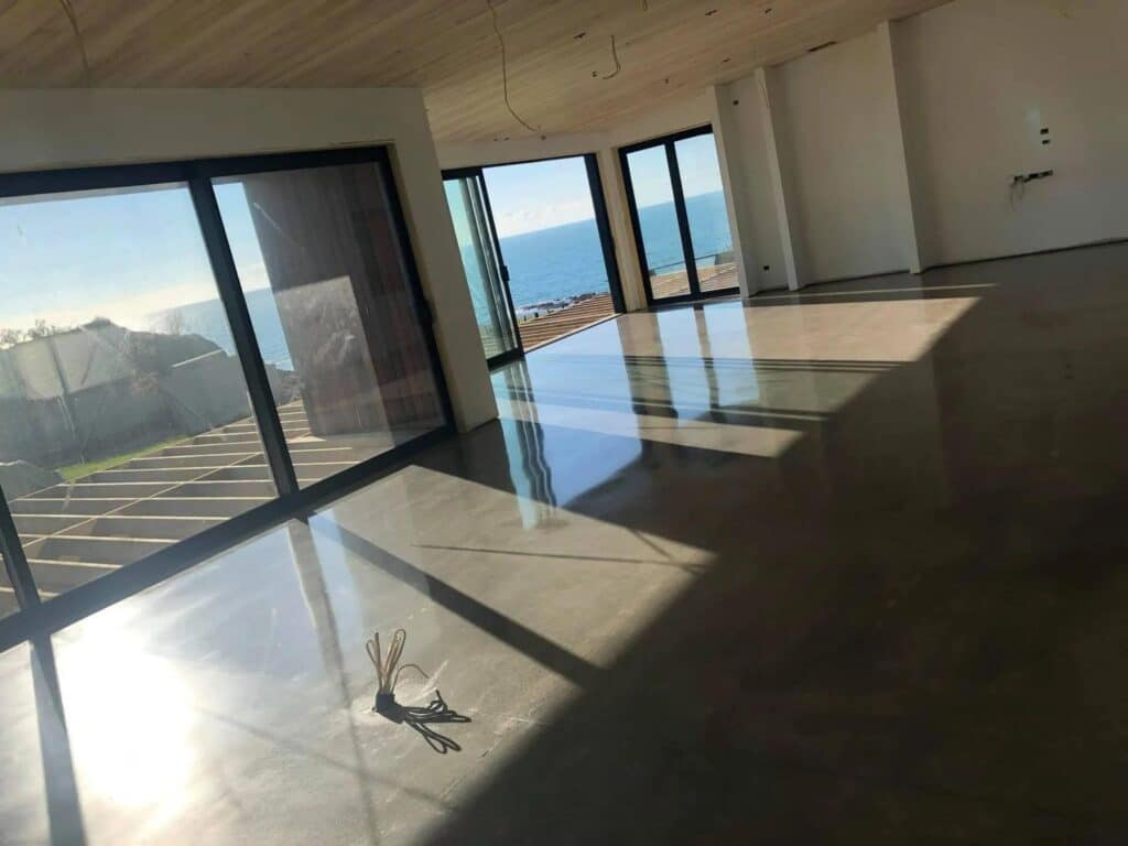 Coastal home polished concrete floor